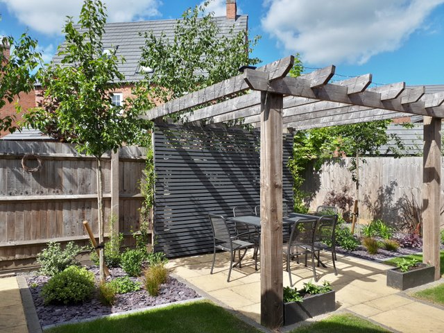 Traditional Arbour with slatted privacy screening